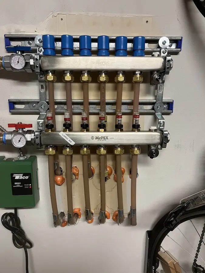 Plumber performing Water Heater Repair at a residential property in Pecan Grove